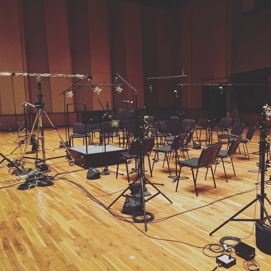 Live room set with chairs, stands and microphones